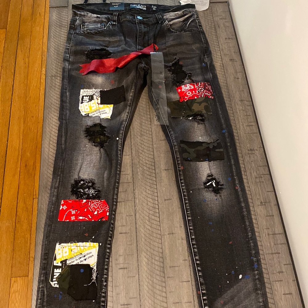 Cote de nuits distressed jeans with patch designs